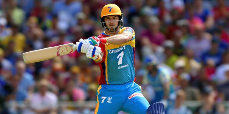 Cricket batsman in Channel 7 uniform, swinging bat in stadium.