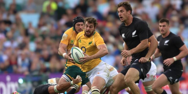 Australian and New Zealand rugby players clashing mid-game on field