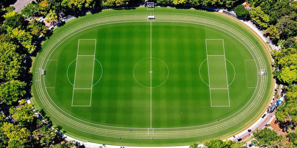 AFL oval aerial view with boundary lines and goalposts