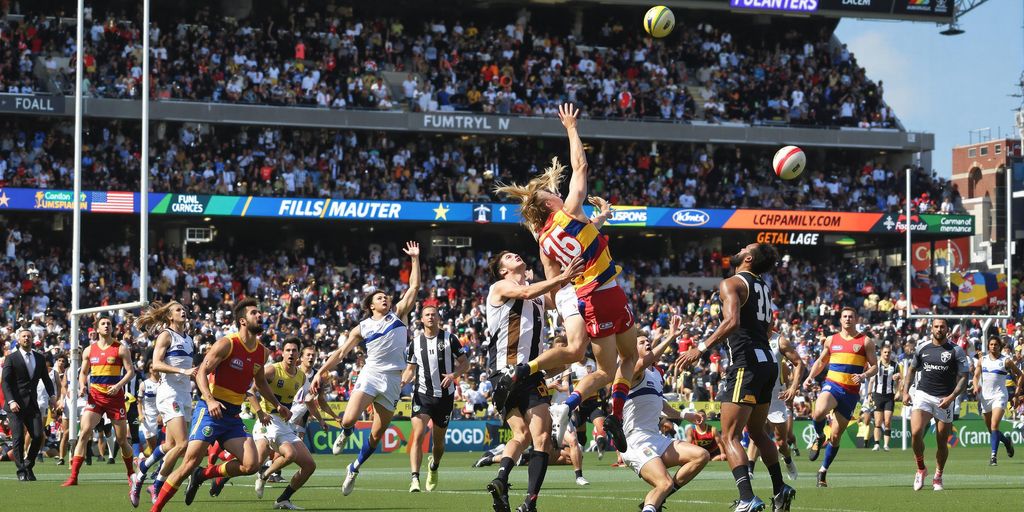 Aussie Rules players jumping for ball on green field