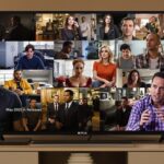 Group of people watching TV with new Netflix shows