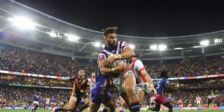 NRL players tackling on stadium field, fans cheering, night