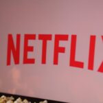 Netflix logo, Indian flag, popcorn, gold trophy.