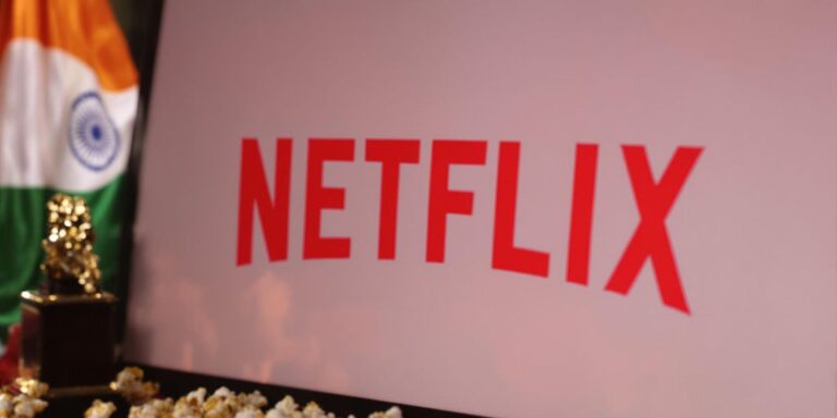 Netflix logo, Indian flag, popcorn, gold trophy.